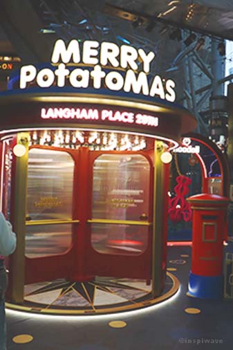 Langham Place TomatoMas Revolving door Most Decorated Christmas Places